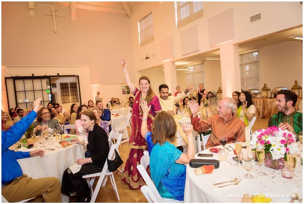 Couple entering at Engagement Party at Liberty Station by Color Shot Studio