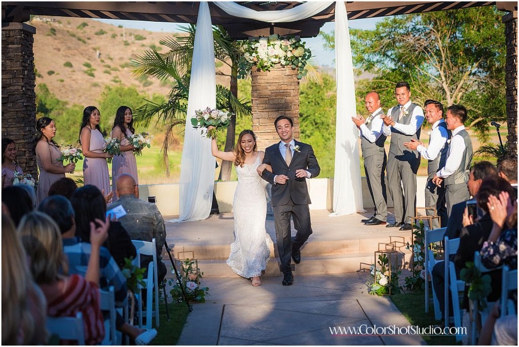 Bride and groom walking after getting married