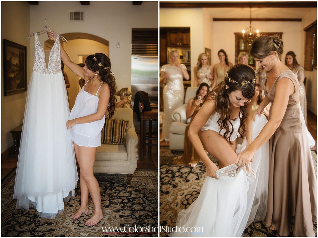 Bride getting into the dress Omni la costa resort wedding photography by color shot studio