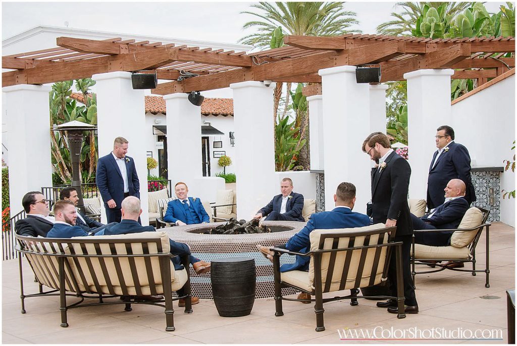 Groom with groomsmen sitting together