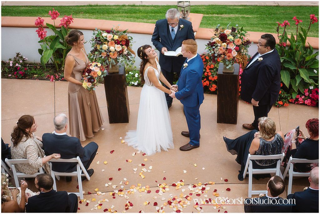 Bride smiling during the ceremony Omni la costa resort wedding photography by color shot studio