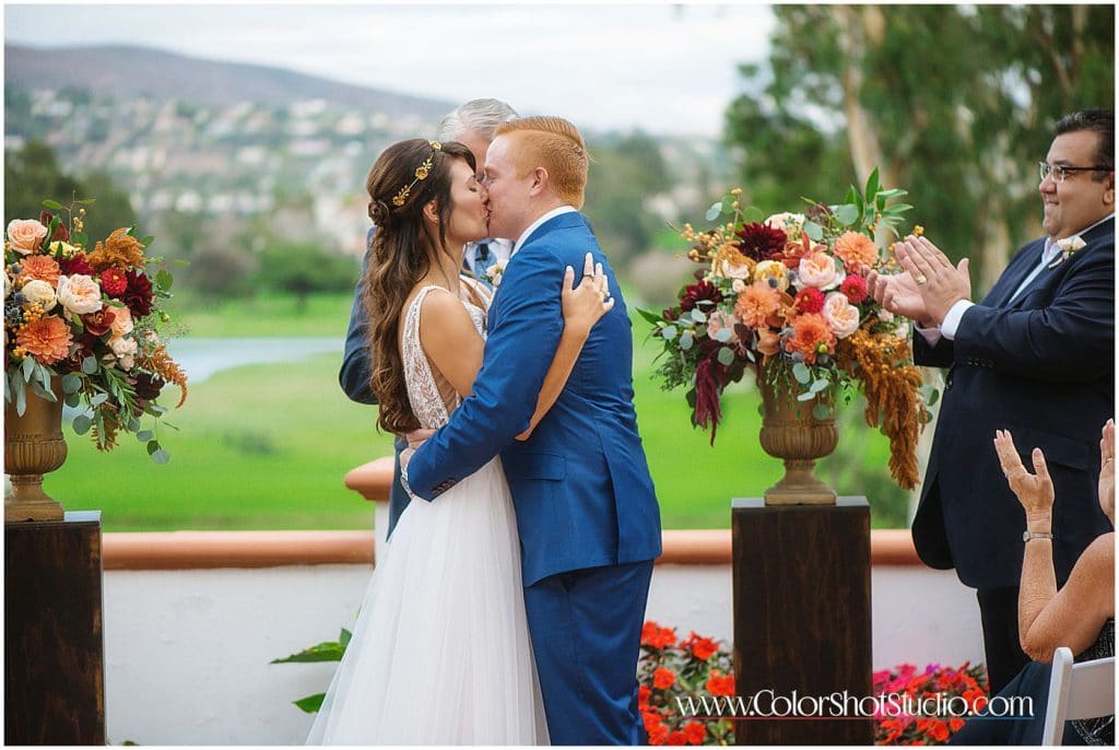 The first kiss Omni la costa resort wedding photography by color shot studio