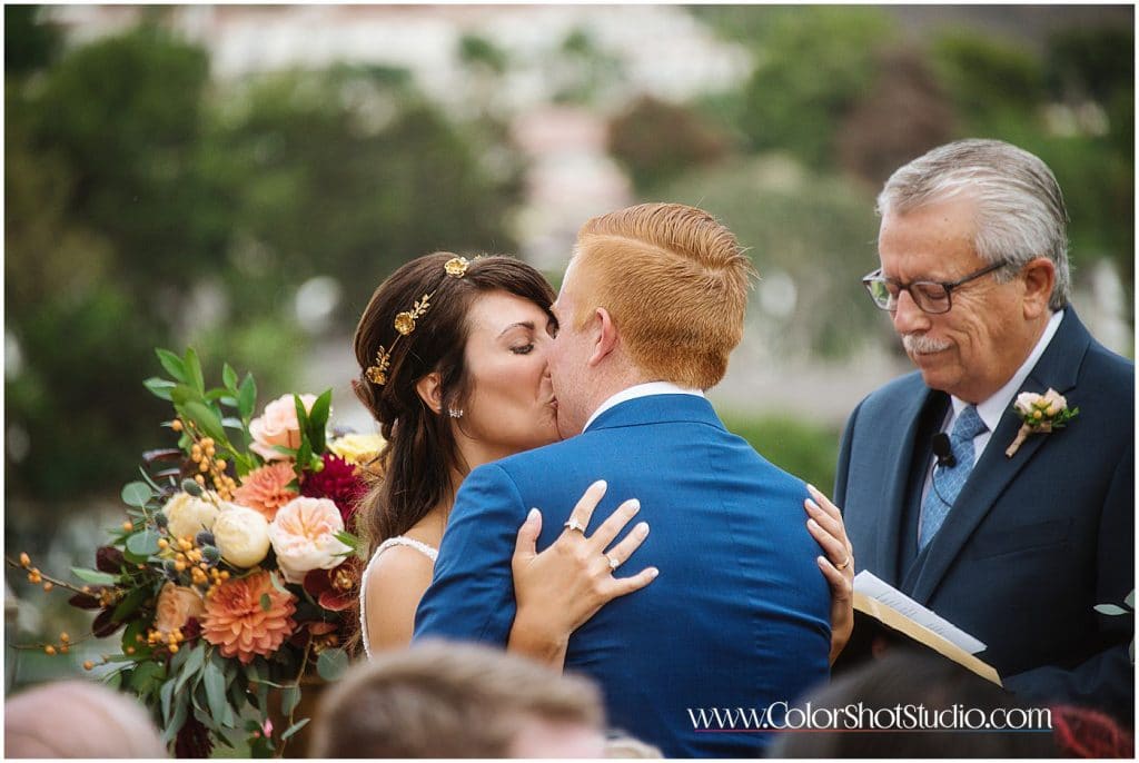 The first kiss Omni la costa resort wedding photography by color shot studio