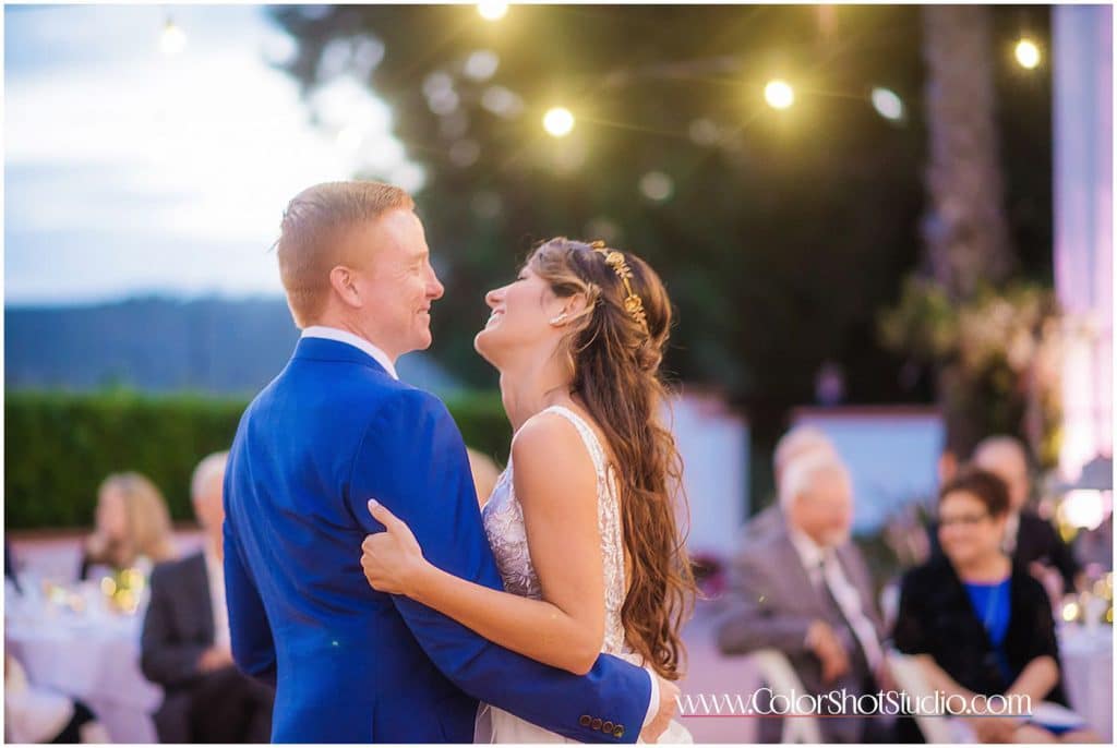Bride and Groom enjoying first dance Omni la costa resort wedding photography by color shot studio