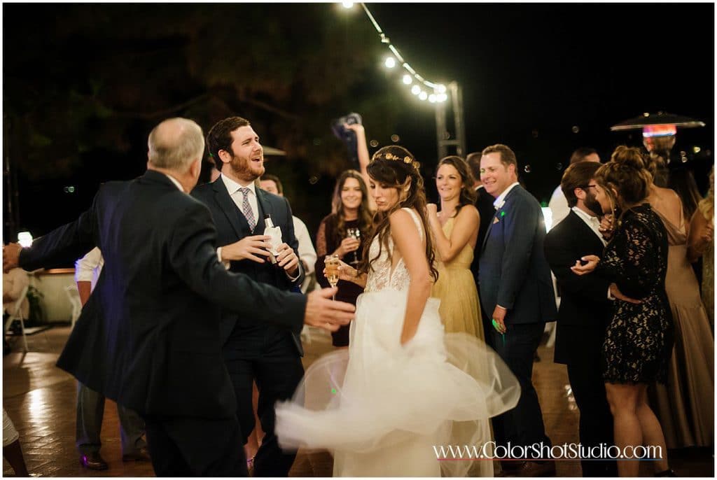 Bride dancing during her reception Omni la costa resort wedding photography by color shot studio