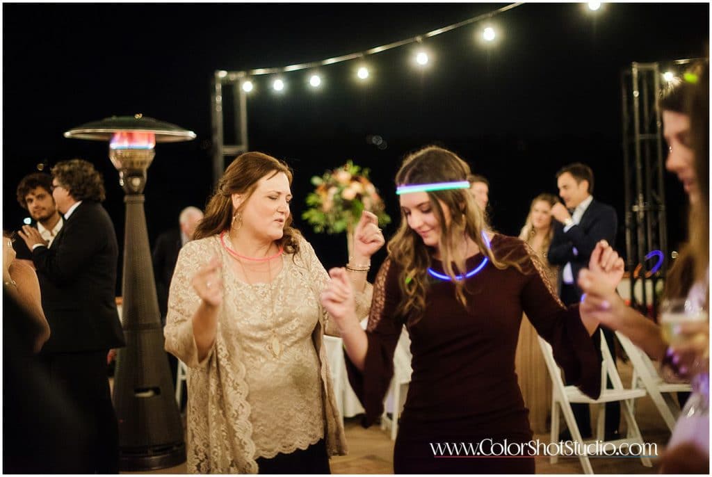 Brides mother dancing on the dance floor during wedding redception