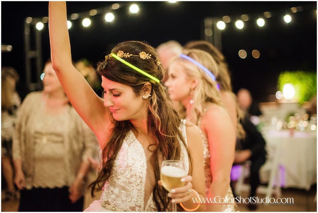 Bride enjoying her drinks Omni la costa resort wedding photography by color shot studio