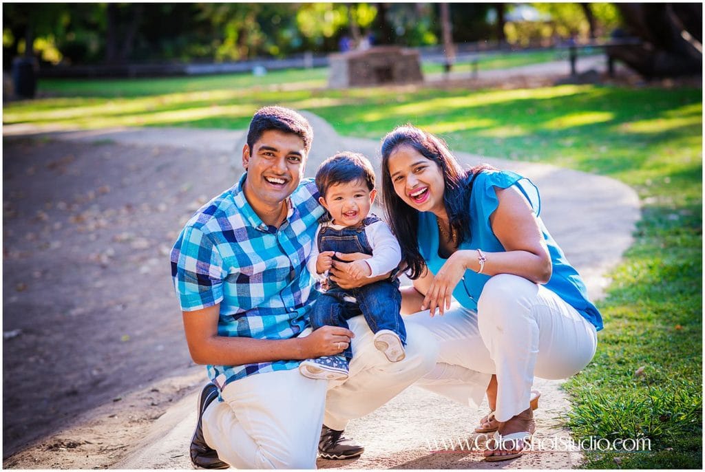 Family of three all smiles