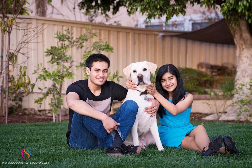 brother sister with their dog